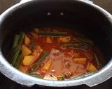 A picture of step 3 of Masala Drumstick.
