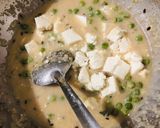 A picture of step 3 of Paneer cashew,peas in white gravy.