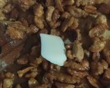 Foto del paso 3 de la receta: Garrapiñada De Maní Con Azúcar Impalpable En Seco