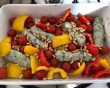 A picture of step 3 of Feta, pine nut, roasted veg and bulgur wheat tray bake! (+ bonus sausages!).