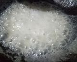 A picture of step 2 of Kesariya Coconut laddu.