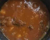 A picture of step 11 of Aloo gosht.