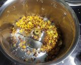 A picture of step 2 of Dessicated coconut rice.