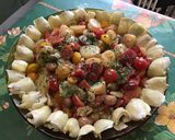 Une image de l'étape 11 de Salade de pommes de terre aux tomates, poivrons, artichauts et olives.