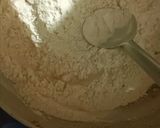 A picture of step 3 of Panjiri Laddu recipe from flour and gram flour.
