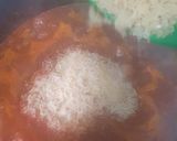 A picture of step 11 of Coconut party jollof rice.