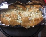 A picture of step 4 of Pull apart garlic cheesy bread.