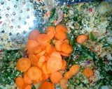 A picture of step 8 of Dambu shinkafa with veg.sauce.