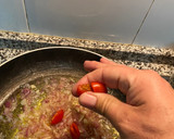 Foto del paso 4 de la receta: Salmón con almejas y langostinos