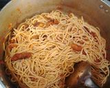 A picture of step 7 of Spaghetti jollof & torn titus smoked fished.