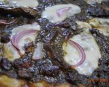 A picture of step 5 of Pizza Ghormeh Sabzi.