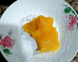 Foto del paso 7 de la receta: Yemas confitadas en almíbar de esencia almendras, canela y anís