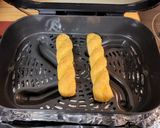A picture of step 1 of Lee's Air Fryer Frozen Bread Sticks.