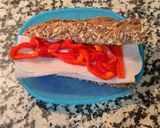 A picture of step 3 of Seven-Grain Bread Sandwich with Turkey Breast and Peppers.
