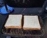 A picture of step 2 of Cheesy veg sandwich.