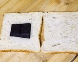 A picture of step 1 of 3 ingredients Chocolate egg sandwich.