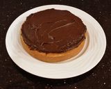 A picture of step 13 of Vanilla Layer Cake with Whipped Chocolate Ganache Filling and Whipped Coconut Cream Frosting.
