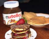 صورة لخطوة 5 من وصفة بان كيك بالشوكولاتة والفراولة 🥞