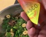 A picture of step 3 of Palak Tabasco sauté veggie.