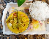 A picture of step 6 of Avial curry with rice.