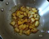 A picture of step 2 of Baigan allu matar ki sabji.