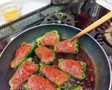 A picture of step 8 of Stuffed Bell Peppers in Sweet and Savory Sauce.