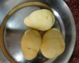 A picture of step 1 of Aloo pitika.