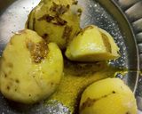 A picture of step 1 of Aloo bathe aloo choka and aloo pithika.