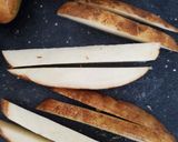 A picture of step 3 of Simple Baked French fries.