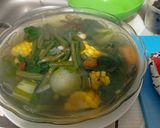 Foto langkah ke 5 dari resep Sayur Asem Daun Lembayung, Jagung, dan Pedoyo.