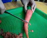 A picture of step 1 of Gajar ka Halwa.