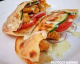 A picture of step 7 of Pita pockets sandwich.