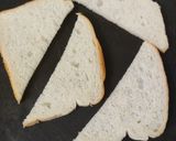 A picture of step 2 of Cheesy Garlic Bread.
