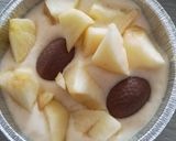 Une image de l'étape 4 de Gâteau aux pommes avec un cœur en chocolat.