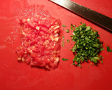 Foto del paso 7 de la receta: Cazuela de merluza con almejas y patatas rosadas