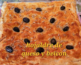Foto del paso 9 de la receta: Hojaldre de queso, bacon y pasas de corinto