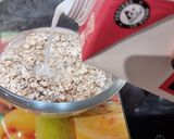 A picture of step 2 of Strawberry Overnight Oats 🍓.
