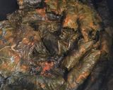 A picture of step 12 of Yaprak Sarma (stuffed grape leaves).