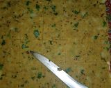 A picture of step 4 of Besan allu snacks.