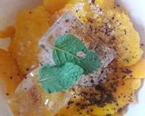 A picture of step 2 of Mango-Coffee Smoothie with Ice-cream & chocolate syrup.