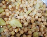 A picture of step 2 of Khathe mithe chole.