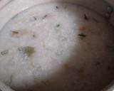 Foto langkah ke 1 dari resep Bubur Ayam Kuning.