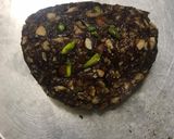 A picture of step 5 of Khajur Dryfruit roll and katori.