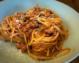 Foto del paso 7 de la receta: Espaguetis con butifarra, salsa de tomate, chocolate y vermut