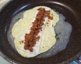 A picture of step 4 of Pork Floss and Cheese Taiwanese Egg Pancake.