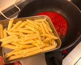 A picture of step 2 of Penne Arrabbiata with pork.