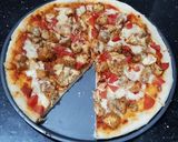A picture of step 18 of Chicken tikka pizza in lock down (karahi baking).