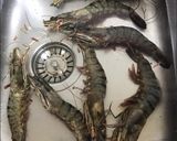 Une image de l'étape 1 de Gambas géantes tigrées au curry crème de gingembre et citron.