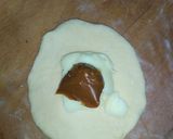 Foto del paso 4 de la receta: Rosca de Pascua rellena con crema pastelera y dulce de leche