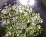 A picture of step 1 of Cheesy spring onion sev sabji.